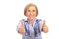 Cheerful senior woman giving thumbs up Royalty Free Stock Photo