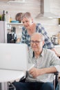 Cheerful senior woman in video conference