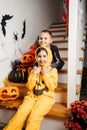 Cheerful siblings ready for halloween trick or treat Royalty Free Stock Photo