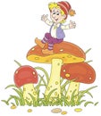 Merry little boy sitting on a big mushroom