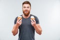 Cheerful smiling bearded man eating cream cake Royalty Free Stock Photo