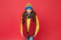 Cheerful smiling hipster child long hair in stylish outfit. Beautiful child. Winter ideas for fun. Fashion shop. Winter