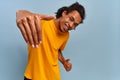 Cheerful smiling positive african-american young student dancing