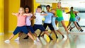 Preteen dancers practicing dance routine with female choreograph Royalty Free Stock Photo