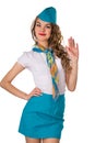 Cheerful stewardess has raised a hand, welcoming Royalty Free Stock Photo