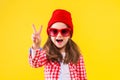 Colorful casual child girl isolated on yellow background Royalty Free Stock Photo