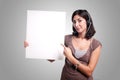 Cheerful support phone operator holding board