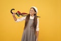 cheerful teen child hold colorful parasol. kid in beret with rainbow umbrella. autumn season Royalty Free Stock Photo