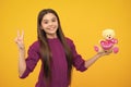 Cheerful teen child hold toy. Happy childhood. Kid playing toy. Teen with toy teddy bear with love heart for valentines Royalty Free Stock Photo