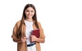 cheerful teen girl holding school diary in studio. teen girl with school diary book. photo of teen girl Royalty Free Stock Photo