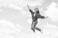 cheerful teen girl jumping high. kid jump outdoor. kid fashion and beauty. sense of freedom. portrait of energetic child