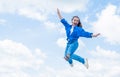 cheerful teen girl jumping high. kid jump outdoor. kid fashion and beauty. sense of freedom. portrait of energetic child