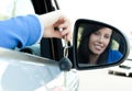 Cheerful teen girl sitting in her car holding keys Royalty Free Stock Photo