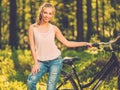 Cheerful teenage on a bicycle outdoors Royalty Free Stock Photo