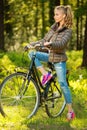 Cheerful teenage on a bicycle outdoors Royalty Free Stock Photo