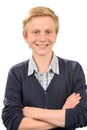 Cheerful teenage boy standing arms crossed