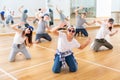 Teens hip hop dancers posing on knees