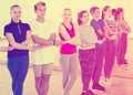 Cheerful teens studying folk style dance