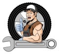 Cheerful tire specialist Royalty Free Stock Photo