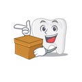 A cheerful tooth cartoon design concept having a box Royalty Free Stock Photo