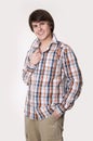 Cheerful toothy young man in checked shirt and smart casual wear Royalty Free Stock Photo