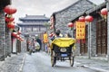 Cheerful tourists in a rickshaw, Beijing, China Royalty Free Stock Photo