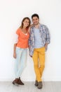 Cheerful trendy couple standing