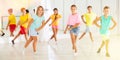 Cheerful tweens learning vigorous dance in choreography lesson