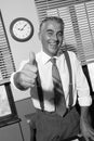 Cheerful vintage businessman thumbs up