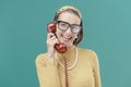 Cheerful vintage style woman on the phone Royalty Free Stock Photo