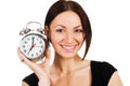 Cheerful woman with alarm clock