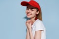 cheerful woman ape face red cap fashion summer blue background Royalty Free Stock Photo