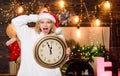 Cheerful woman.. Be happy. Time to celebrate. girl in red santa claus hat. Midnight. happy new year. christmas Royalty Free Stock Photo