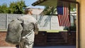 Excited family meeting serviceman at home Royalty Free Stock Photo