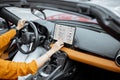 Woman controlling car with a digital dashboard Royalty Free Stock Photo