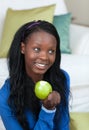 Cheerful woman eating an apple Royalty Free Stock Photo