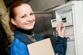 Cheerful woman engineer in a boiler