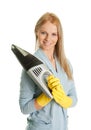 Cheerful woman with handheld vacuum cleaner Royalty Free Stock Photo