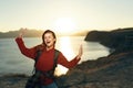 cheerful woman hiker rocky mountains landscape sunset fresh air