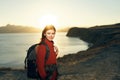 cheerful woman hiker rocky mountains landscape sunset fresh air