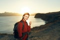 cheerful woman hiker rocky mountains landscape sunset fresh air