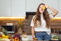 Healthy lifestyle concept, beautiful smiling woman Holding Fresh Lemon Slice In Front of her One Eye While Looking at Royalty Free Stock Photo