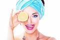 Cheerful woman - juicy delicious lemon (orange)