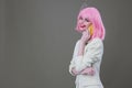 cheerful woman pink wig talking on the phone Royalty Free Stock Photo