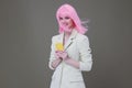 cheerful woman pink wig talking on the phone Royalty Free Stock Photo