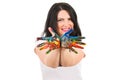 Cheerful woman showing messy colorful hands