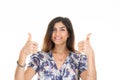 Cheerful woman showing two thumbs up fingers proud victory in white background Royalty Free Stock Photo