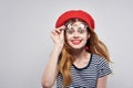 cheerful woman in a striped t-shirt red lips gesture with his hands Fresh air Royalty Free Stock Photo