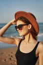 cheerful woman in sunglasses Sandy coast landscape sun