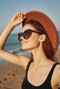 cheerful woman in sunglasses Sandy coast landscape sun